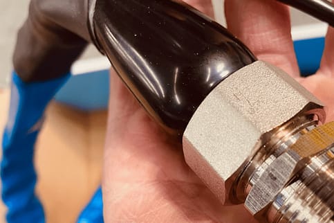 The end of a heated hose 100 ft for an rv